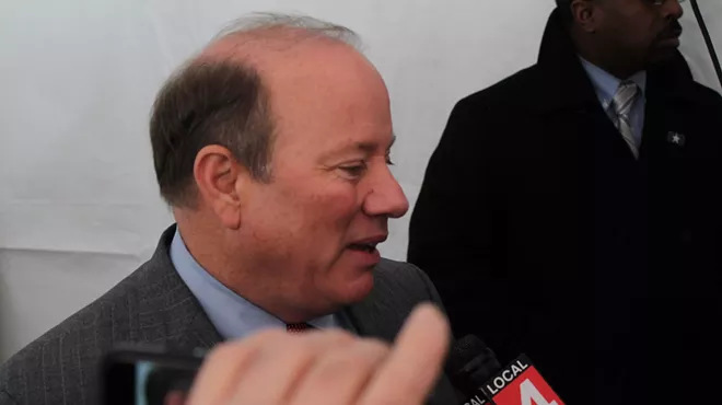 Detroit Mayor Mike Duggan speaks with reporters after a press conference on Jan. 15, 2015.