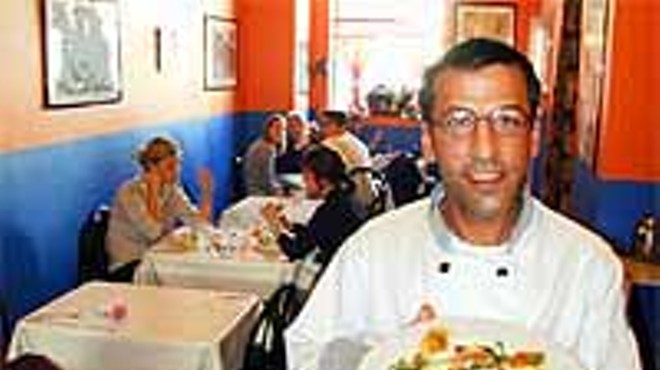 L.A. Express' owner-chef, Michael Chamas, serves chicken lasagna.