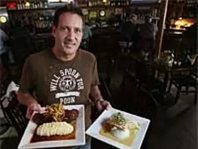 Mt. Chalet II chef Jeff McArthur with the catch of the day and a bistro-style New York strip.