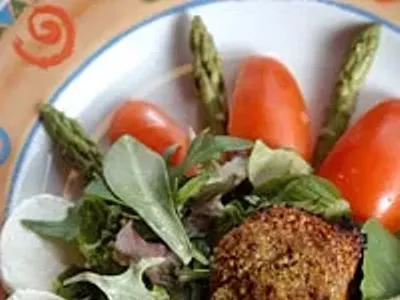 Pistachio Salmon Salad from Union Street in Detroit features baked, pistachio-crusted Atlantic salmon served on a bed of organic mixed greens.