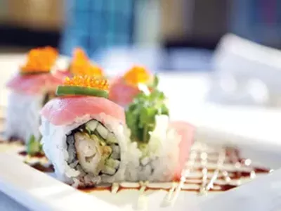 Shrimp tempura sushi roll topped with Ahi tuna.