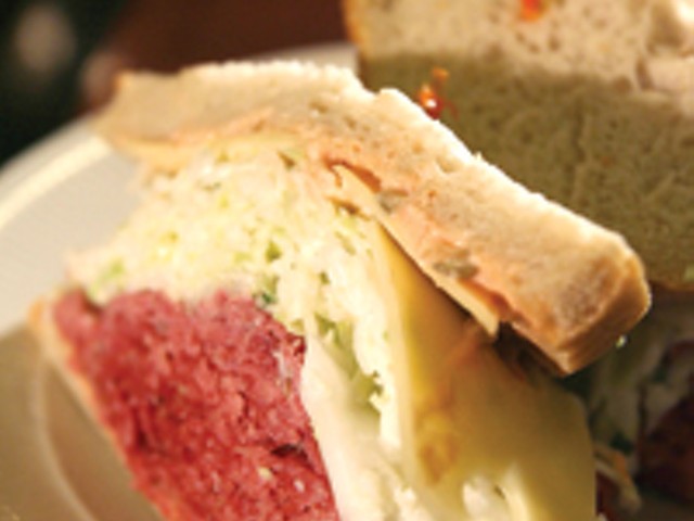The West Side Story corned beef sandwich with coleslaw and Swiss cheese.