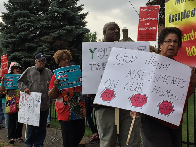 Protesters call for halt on tax foreclosures in Detroit in 2017.
