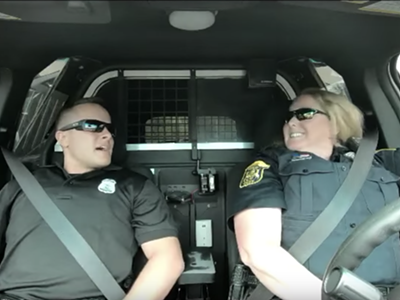 Image: Shelby Twp. police deliver police car karaoke after Twitter campaign success