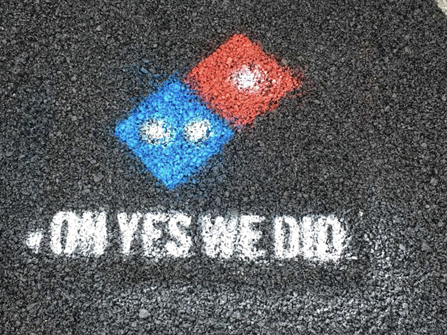 Domino's Pizza is paving the nation's potholes,  but not Michigan's