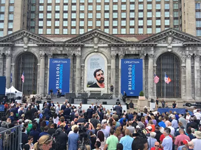 Ford Motor Co. celebrates its purchase of Detroit’s long-abandoned Michigan Central Station. Yes, that is a photo of Phil Cooley.