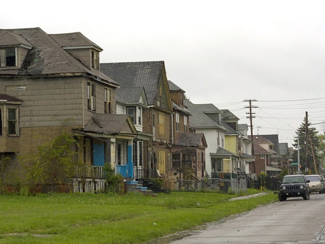 A row of dilapidated houses at Crane and Charlevoix on Detroit’s east side. Eleven houses on this block have been foreclosed since 2002.