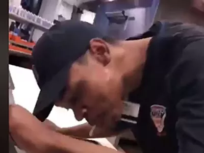 Image: Comerica Park employee arraigned after allegedly spitting on pizza in viral video