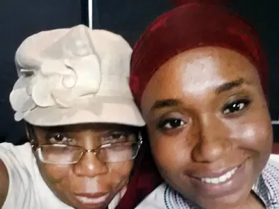 Siwatu-Salama Ra (right) and her mother, Rhonda Anderson.