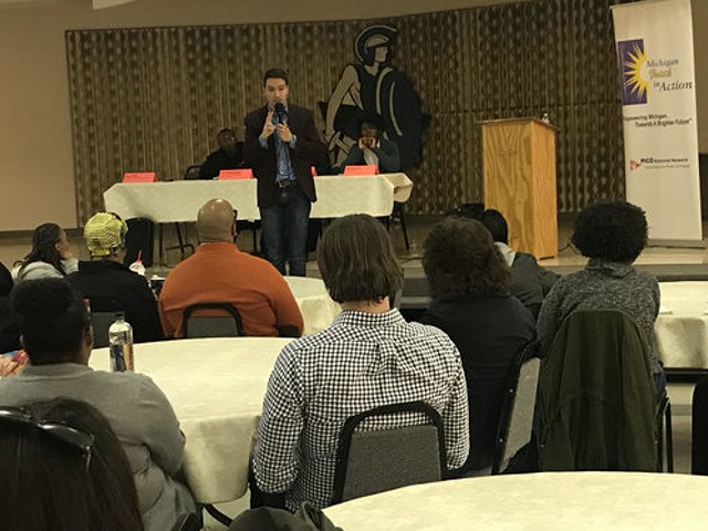 Igor Volsky with the group Guns Down America spoke at a town hall meeting Monday night in Flint.