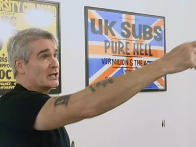 Henry Rollins pointing.