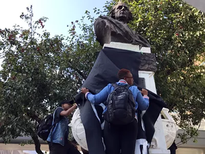 Protesters draped a black cloth over the Christopher Columbus statue in downtown Detroit in 2017.