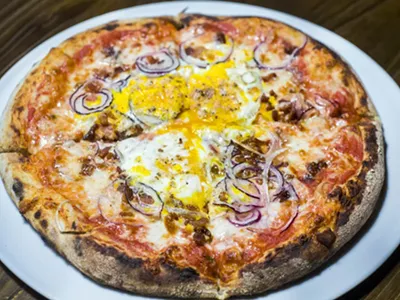 Fox Hollow Farm pizza with egg, pancetta, and red onion.