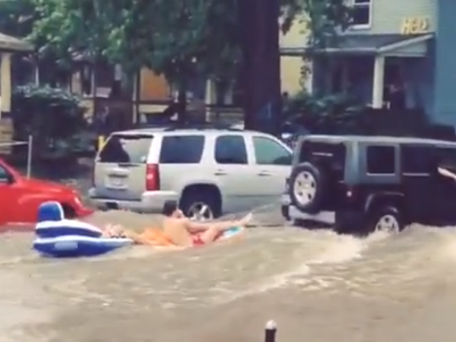 Watch: Jeep tows tubers down flooded Ann Arbor street