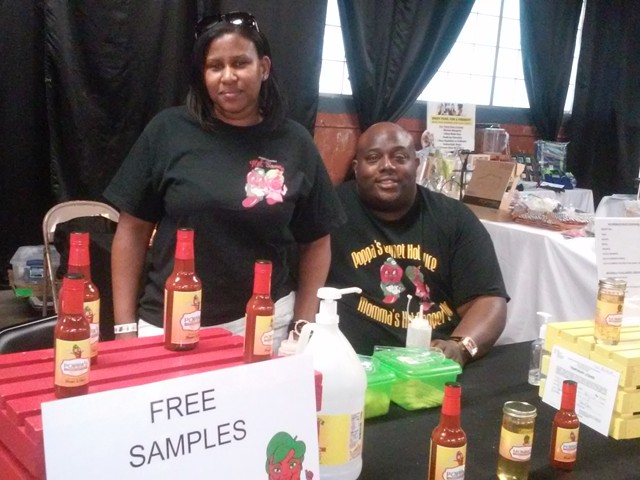 Roosevelt and D'Ette Walton of Ypsilanti, selling their Poppa's Gourmet Hot Sauce.