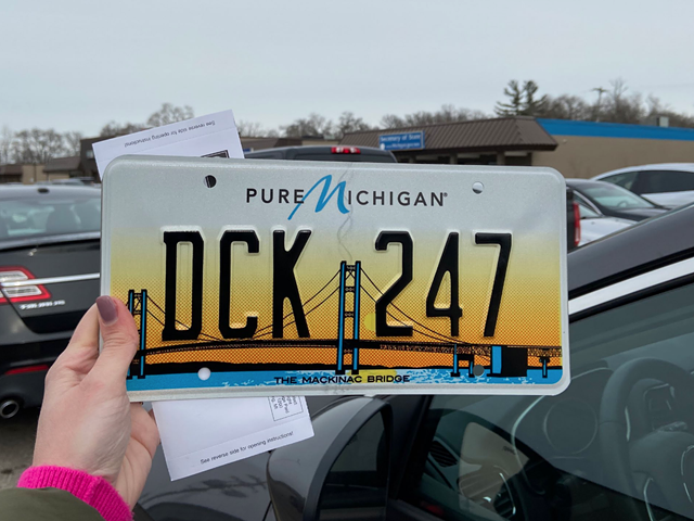 WOOD-TV reporter coincidentally gets 'DCK 247' license plate