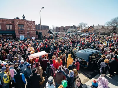 Detroit’s Marche du Nain Rouge parade draws thousands.