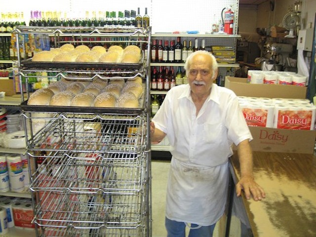 Vince Cucci, baking the bread on a morning in 2014.