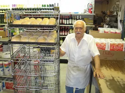 Vince Cucci, baking the bread on a morning in 2014.