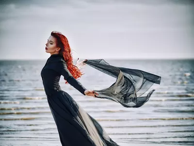This is how goth people spend their time at the beach. We assume.