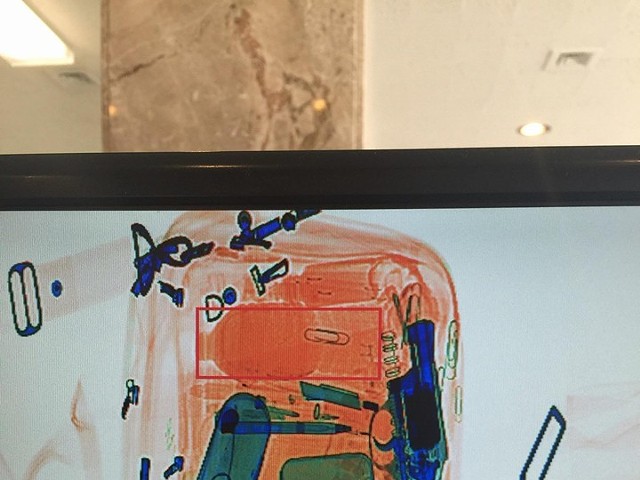 An X-ray image of a bag that slipped into City Hall on Monday with a handgun inside.