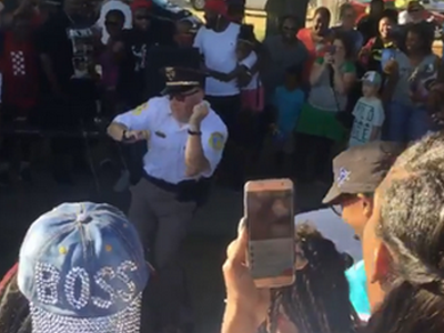 Image: Video: Kalamazoo cop dances to Tupac at Black Lives Matter walk