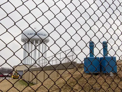 Image: Six state officials charged in Flint water crisis investigation