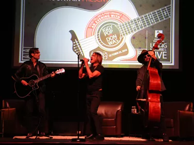Dean Fertita, left, Iggy Pop, and Don Was play at The Majestic on Sunday.