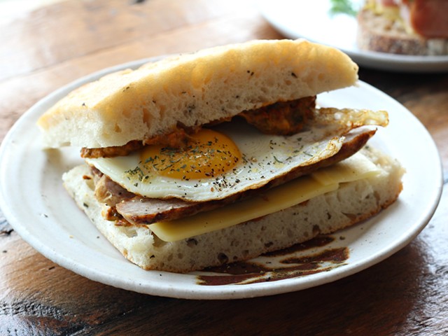 The egg and sausage breakfast sandwich.