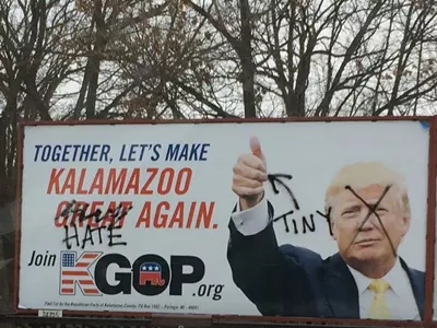 Image: A billboard in Kalamazoo proudly touting Trump was defaced over the weekend