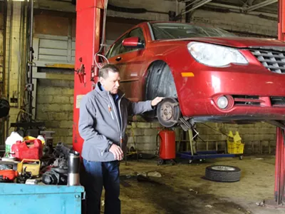 Tony Greiner in his Metro 25 auto shop on Detroit’s east side.