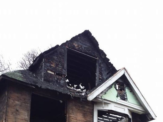 This was the blighted, fire-ravaged house before it was torn down.