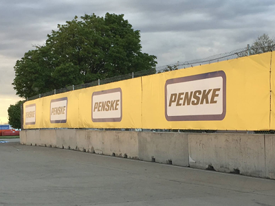 Race fans who support Roger Penske's Detroit Belle Isle Grand Prix are attempting to intimidate race opponents.