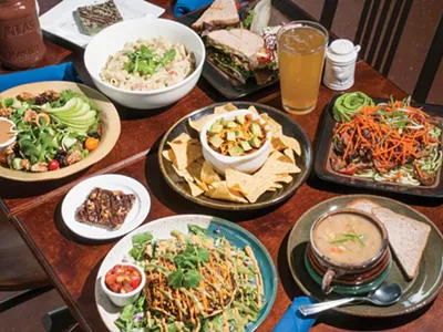 (Counterclockwise from bottom left) Tostada, magic bar, Michigan Salad, Arugala Alfredo, ABLT, s mug of Neu Kombucha, Thai pasta salad, lima bean corn chowder, Southwest Appetizer w/sloppy joe (center).