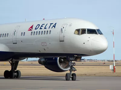 Image: Woman taken off Delta flight for medical condition says she was discriminated against