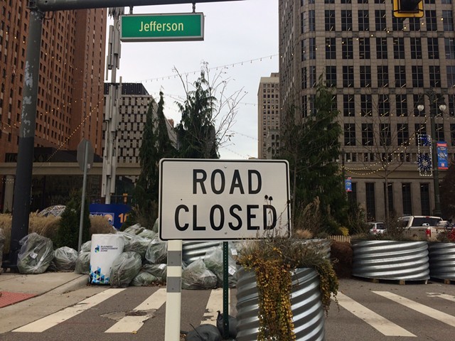 A "road closed" sign on Jefferson near Woodward, the site of the Spirit of Detroit Plaza.
