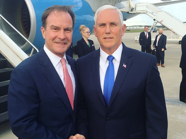 Michigan Attorney General Bill Schuette poses with Vice President Mike Pence.