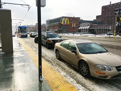 Image: A reminder to please not park on the QLine tracks