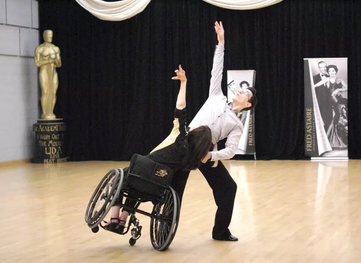 Image: The Rehabilitation Institute of Michigan’s Cheryl Angelelli, left, with partner Tamerlan Gadirov during a Dance Mobility class at Fred Astaire Dance Studio in Bloomfield Hills.