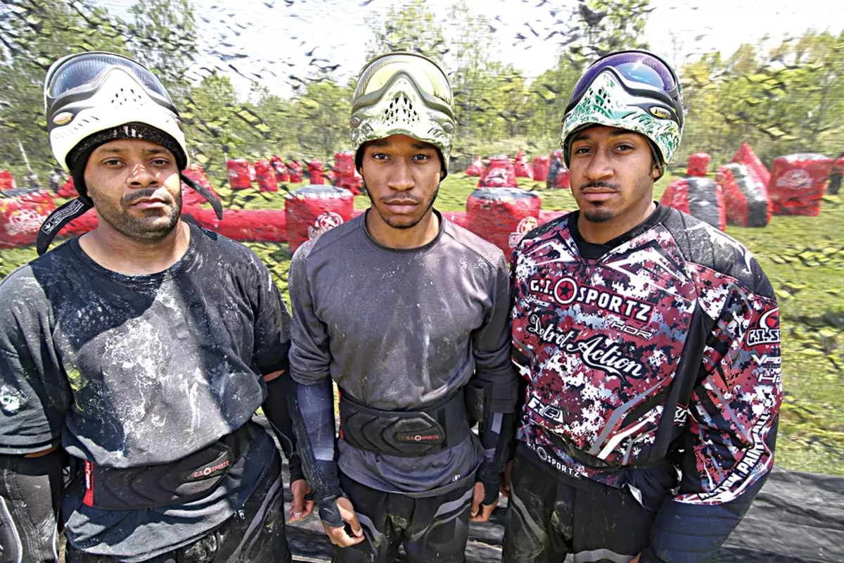 Image: Lenard Covington, left, 38, of Farmington Hills, Michael Lloyd, 21, of Detroit, and Will Lloyd, 28, of Detroit, at a Detroit Action Paintball Practice in Taylor.
