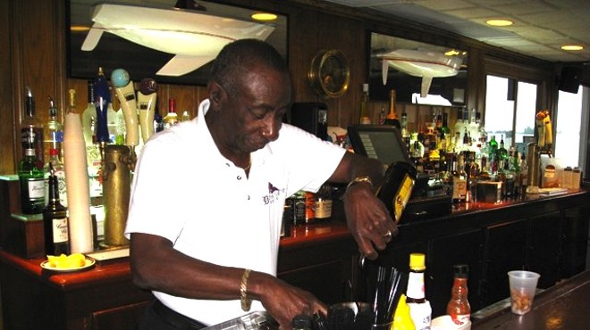 Jerome Adams mixing his signature drink behind the bar at Bayview Yacht Club in 2011.