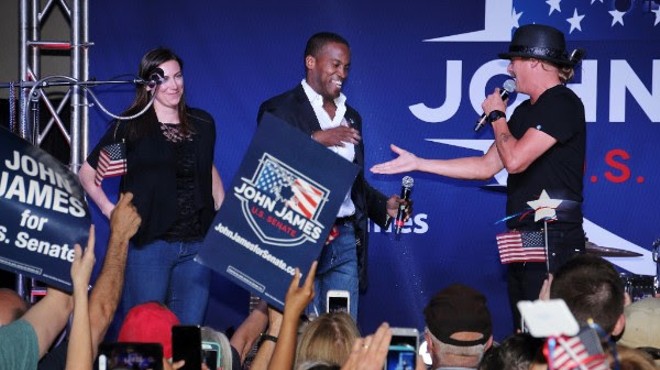 Senate candidate John James, center, and Kid Rock, right.