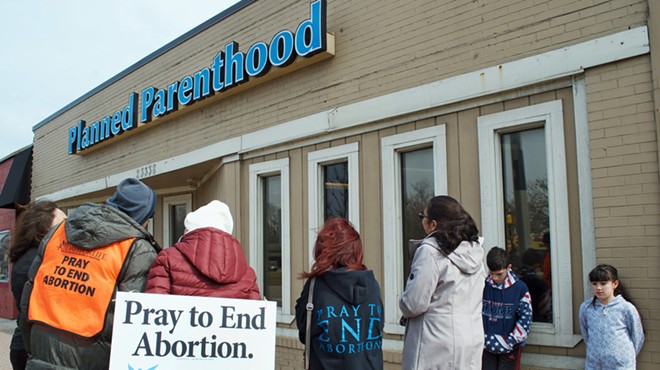 Pro-life protesters surround Ferndale's Planned Parenthood.