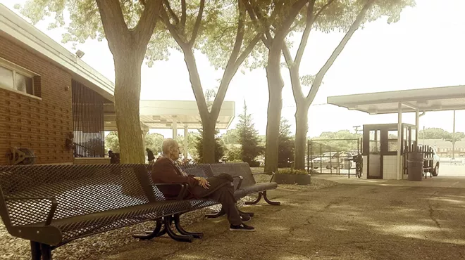 "Old Man George" waits for the doors to open on Opening Day at Hazel Park Raceway, June 27, 2014.