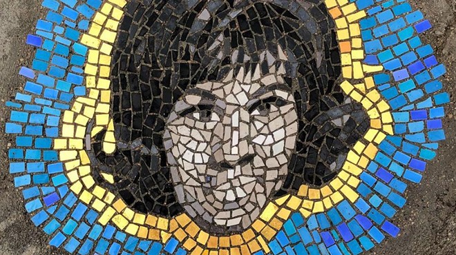 Artist gives potholes a mosaic makeover at Eastern Market