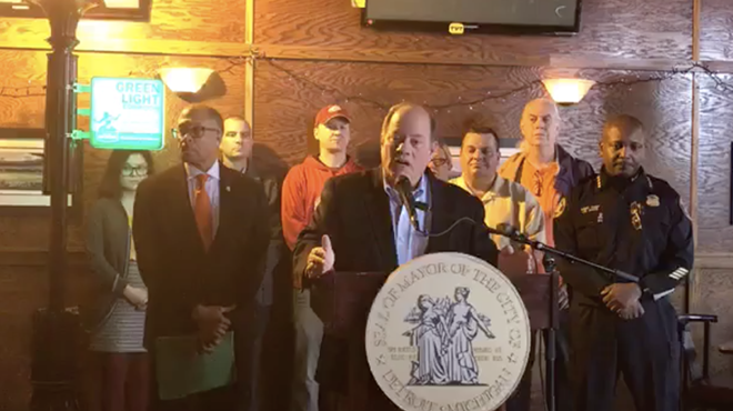 Mayor Mike Duggan announces the most recent expansion of the controversial Project Green Light to Corktown from inside McShane’s Irish Pub