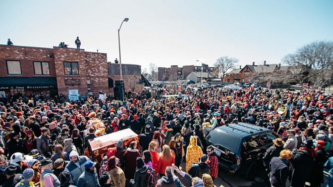 Detroit’s Marche du Nain Rouge parade draws thousands.