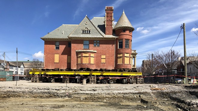 The David Mackenzie House was moved to the opposite side of the block to make way for a theater expansion.