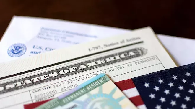 Image: Michigan's immigrant families face green card hurdles under federal rule change