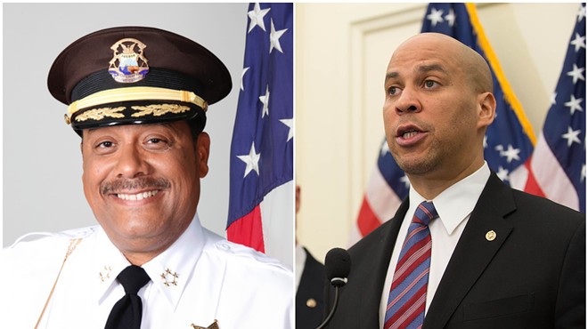 Sheriff Benny Napoleon (left) and presidential candidate Cory Booker.